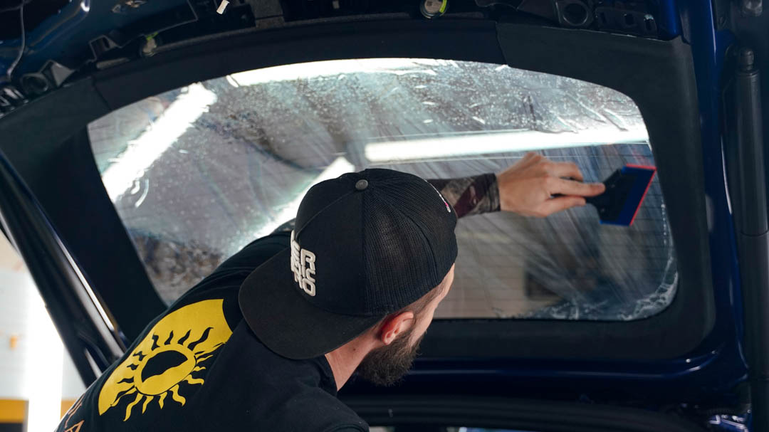Tesla Model S getting Ceramic Window Tint on Rear Windshield.